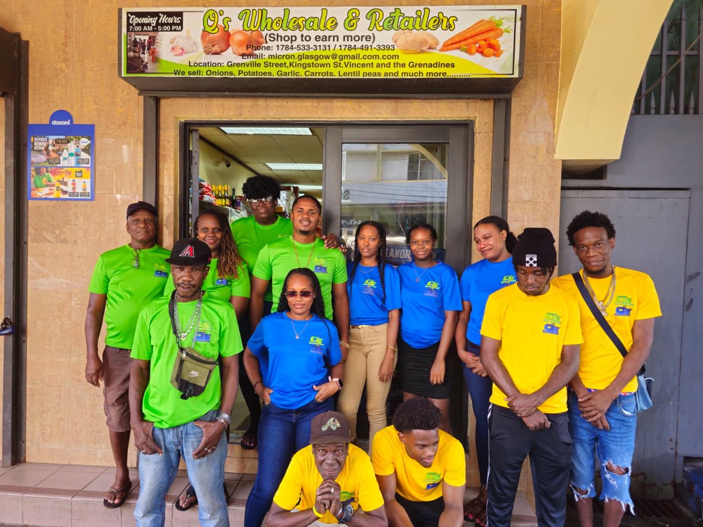 The Q's team outside the store in Kingstown